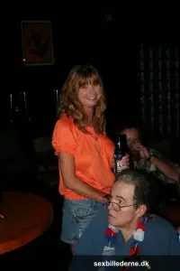 Slutty mature swinger wives expose their big tits & get naughty at a party